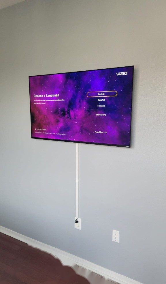 TV mount with in-wall cable concealment, cords fully hidden